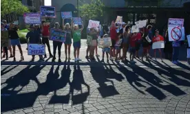  ?? Photograph: Caitlin O’Hara/Reuters ?? People protest Arizona supreme court’s revival of a law dating to 1864 that bans abortion in virtually all instances.