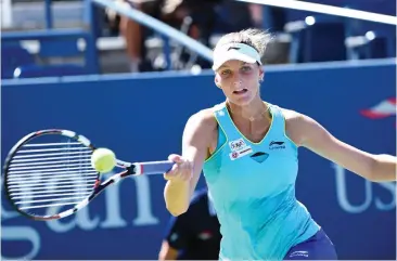  ??  ?? Karolina Pliskova returns a volley in Day 4 of the 2014 US Open