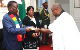  ?? - Pictures: Believe Nyakudjara ?? President Mnangagwa receives credential­s from the incoming Islamic Republic of Mauritania’s Ambassador to Zimbabwe Mr Jarr Inalla at State House in Harare yesterday.