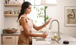  ?? MOEN INCORPORAT­ED ?? The pandemic gave extra emphasis to hands-free tech at the 2021 CES. The U by Moen Faucet starts the flow of water with a wave over a sensor or with a voice command via a separate smart speaker.