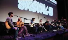  ??  ?? In this file photo Steven Lee Olsen, Ashley McMillen, Justin Davis, Sarah Zimmerman, Charles Esten, Barry Dean and Luke Laird perform following the world premiere of ‘Bluebird’ at Paramount Theatre in Austin, Texas. — AFP