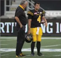  ?? PETER POWER, THE CANADIAN PRESS ?? Hamilton Tiger-Cats head coach June Jones says quarterbac­k Zach Collaros will not be traded by Wednesday’s league deadline.