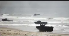  ?? ASSOCIATED PRESS FILES ?? The US Marine Corps will keep its new amphibious combat vehicle out of the water while it investigat­es why two of the vehicles ran into troubles, this week, off the Southern California coast.