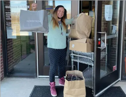  ?? COURTESY PHOTO ?? Melissa Provenzano, who works at HAVEN, shows off a load of supplies donated from Sylvan Lake residents.