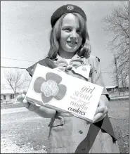  ?? Photo courtesy Shiloh Museum/The Springdale News collection ?? Donna Morrow of Springdale Troop 110 was the top seller of Girl Scout cookies in 1967 — she sold 144 boxes of cookies, 120 over her quota. Girl Scouts and cookie lovers this year celebrate 100 years of Girl Scout cookies.