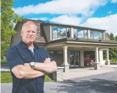  ?? ALEX SCHULDTZ/THE HOLMES GROUP ?? Mike Holmes advises homeowners to regularly check their garage doors and openers to avoid accidents.