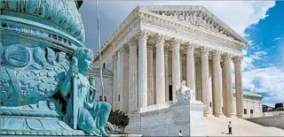  ?? J. SCOTT APPLEWHITE/AP ?? Justices issued a terse ruling that also sends the government back to the appeals court.