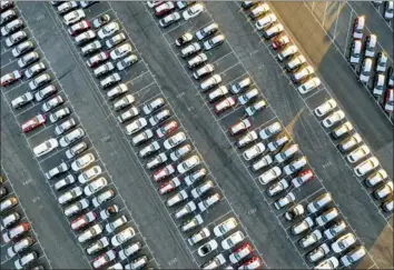  ??  ?? IMPORTED CARS at the Port of Los Angeles. Electric cars account for 1.7 million vehicle sales annually worldwide, and that could hit 8.5 million by 2025. The change is happening quickest in Europe and China.
