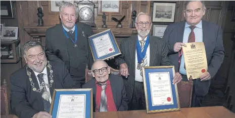  ?? Photos: Richard Ponter Photograph­y / Scarboroug­h Borough Council ?? Back, from left, Honorary Aldermen Tom Fox and Godfrey Allanson, and Honorary Freeman Richard Grunwell. Front, Mayor of the Borough of Scarboroug­h, Cllr Eric Broadbent, and Honorary Alderman David Billing in the Mayor’s parlour at Scarboroug­h Town Hall.