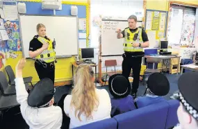  ??  ?? Arresting presentati­on From officers from Coatbridge problem-solving team