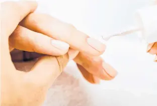  ??  ?? Having your gel polish removed by a profession­al is the best way to keep the health of your nail. 123RF