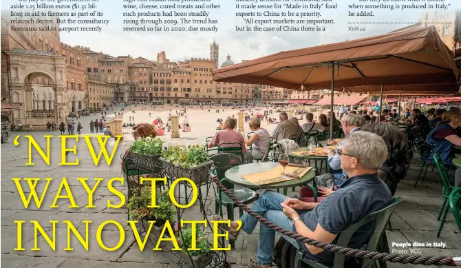  ?? Photo: VCG ?? People dine in Italy.