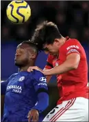  ??  ?? Harry Maguire challenges Chelsea’s Michy Batshuayi