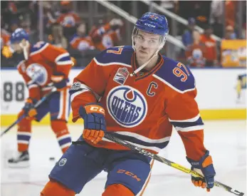  ?? CP PHOTO ?? Edmonton Oilers captain Connor McDavid takes part in warm up before taking on the San Jose Sharks in Edmonto on April 14. The Edmonton Oilers beefed up their top line Tuesday as they prepared for a second round series against the Anaheim Ducks, a...