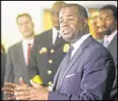  ?? EMILY JENKINS/ EJENKINS@AJC.COM ?? Mayor Kasim Reed said the rise in killings is “troubling.”