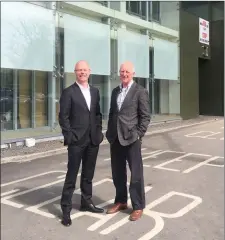  ??  ?? Deputy Stephen Donnelly and Joe O’Connell outside Ashford Studios