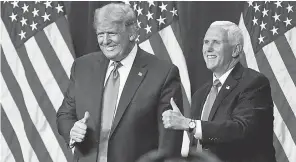  ?? CHRIS CARLSON/ AP ?? President Donald Trump and Vice President Mike Pence at the Republican National Convention on Aug. 24 in Charlotte, North Carolina.