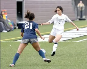  ?? Bud Sullins/Special to Siloam Sunday ?? Siloam Springs Joceline Andrade takes a kick as Greenwood’s Chenyck Moore defends during Thursday’s match at Panther Stadium.