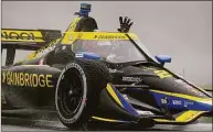  ?? Michael Conroy / Associated Press ?? Colton Herta celebrates after winning at Indianapol­is Motor Speedway on Saturday.