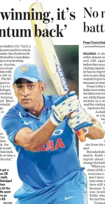  ?? REUTERS ?? MS Dhoni got a reprieve on 29 when the bails weren’t dislodged after Vishwa Fernando hit the stumps. He went on to score an unbeaten 45.