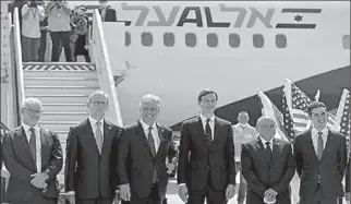  ?? TEL AVIV
-AFP ?? Senior US Presidenti­al Adviser Jared Kushner and US National Security Adviser Robert O'Brien with members of the Israeli-American delegation in front of the El Al's flight LY971, which will carry the delegation from Tel Aviv to Abu Dhabi at Ben Gurion Airport, near Tel Aviv, Israel.