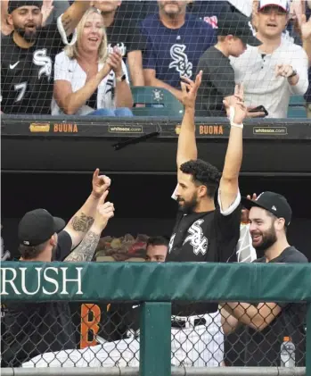  ?? GETTY IMAGES ?? Seby Zavala takes a curtain call after his fourth-inning grand slam, one of his three home runs.