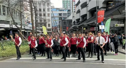  ?? PHOTO: GED CANN/STUFF ?? Te Kura Ma¯ ori o Porirua led the crowd into Wellington’s Civic Square, performing a wero.