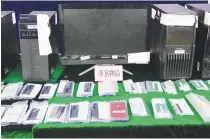  ?? GLOBAL TIMES PHOTO ?? IN THE HOUSE
Police display the items used by drug syndicates operating in Guangdong, China on Oct. 16, 2020 after a massive raid.