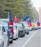  ?? ?? Samoan supporters’ cavalcade of colour in central Napier.