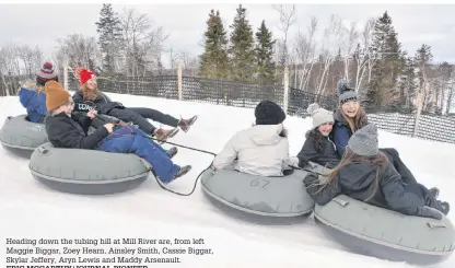  ?? ERIC MCCARTHY/JOURNAL PIONEER ?? Heading down the tubing hill at Mill River are, from left Maggie Biggar, Zoey Hearn, Ainsley Smith, Cassie Biggar, Skylar Jeffery, Aryn Lewis and Maddy Arsenault.