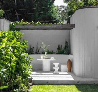  ??  ?? OUTDOOR NOOK Carla reduced the size of the original garage to create this lovely little courtyard with curved bench seating and pergola. Regent indoor/outdoor table and Celine concrete stool, both Coco Republic. Terracotta vessel, McMullin& Co. POOL Custom outdoor shower. Handmade Moroccan tiles, Di Lorenzo Tiles. Pots, Garden Life.