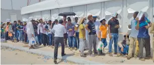  ??  ?? the Shahama centre has been witnessing long queues of amnesty-seekers despite the heat.