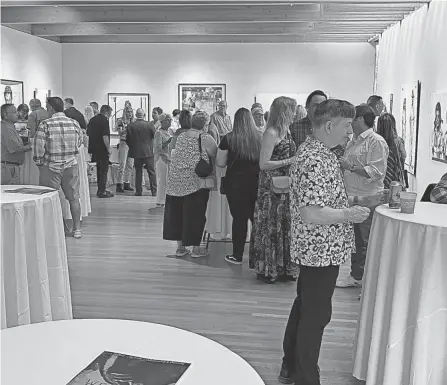  ?? MANSFIELD ART CENTER ?? A preview reception for John Mellencamp's exhibit, “Paintings & Assemblage­s,” was held Saturday night at the Mansfield Art Center