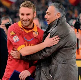  ?? LIVERANI ?? II presidente della Roma James Pallotta, italoameri­cano di Boston, con Daniele De Rossi