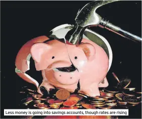  ?? ?? Less money is going into savings accounts, though rates are rising