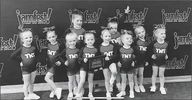  ?? Contribute­d photo ?? Tiny cheerleade­rs: Short Fuse, TNT Cheerleade­rs 6-and-under group, performed in an exhibition last week in the Jamfest Nationals in Hot Springs.