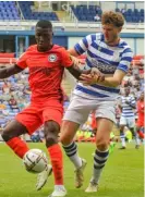  ?? ?? Hometown favourite Tom Holmes was left disappoint­ed by Reading Academy’s downgrade to Category Two status. The centre-half joined the club at the age of eight. Picture: Steve Smyth