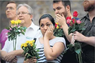  ?? Dan Kitwood Getty Images ?? A VIGIL outside Finsbury Park mosque in London, where one person died and 11 others were injured in the fourth terrorist attack to strike Britain in three months. The victims were leaving two mosques after prayers.