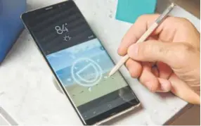  ?? Richard Drew, The Associated Press ?? The stylus sets Samsung’s Note smartphone­s apart from the competitio­n.