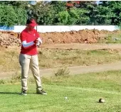  ?? ?? Player teeing off at the tournament