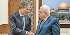  ?? | AFP ?? PALESTINIA­N President Mahmoud Abbas, right, welcomes US Secretary of State Antony Blinken in Ramallah in the occupied West Bank, yesterday.