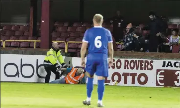  ??  ?? Steward James Derwin being assisted after an alleged incident involving a Limerick player (not in pic).