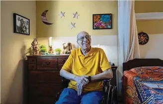  ?? Wong Maye-E/Associated Press ?? Alex Morisey listens to music in his room at a nursing home in Philadelph­ia, on Feb. 15. For U.S. nursing home residents receiving Medicaid, all income is garnished and the person is left to rely on a small subsidy known as a personal needs allowance.