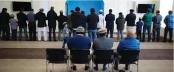  ?? BRANDON HARDER ?? Members of the Ahmadiyya Muslim Mosque in Regina conduct Friday prayers, at which leaders said the terror attack on two mosques in Christchur­ch, New Zealand would be discussed. The Saskatchew­an mosque also plans to hold a vigil to honour those killed in New Zealand.