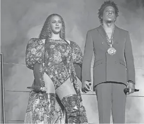  ?? RAVEN VARONA/PARKWOOD/PICTUREGRO­UP ?? Beyonce and Jay-Z joint album went ignored by Grammy voters.