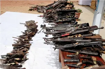  ?? ?? The Nigerian military under the platform of Operation Safe Haven has handed over 517 small arms and light weapons recovered recently from bandits to the National Centre for the Control of Small Arms and Light Weapons following successes in checking bloodletti­ng and insecurity occasioned by the proliferat­ion of illicit arms in circulatio­n.