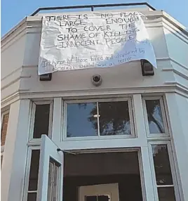  ?? PHOTOS COURTESY OF BRANTLEY MAYERS ?? ‘FREE SPEECH’: Amherst College is under fire after a student hung an anti-war banner, above, the same day the school remembered those lost, below, during the 9/11 terrorist attacks.