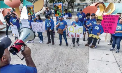  ?? Photograph: Cristóbal Herrera/EPA ?? South Florida's outdoor workers demand better working conditions and protection against the extreme heat during the 'Qué Calor' demonstrat­ion in Miami.