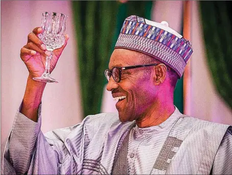  ??  ?? Buhari...toasting to a better health