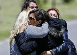  ?? ESTEBAN FELIX / AP ?? Relatives of missing crew member Celso Oscar Vallejo at the Mar de Plata Naval Base in Argentina react Thursday to the news that a sound detected during the search for the ARA San Juan submarine was consistent with that of an explosion.